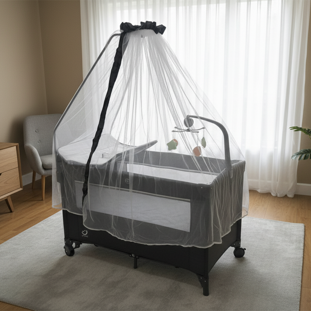 سرير أطفال مع ناموسية وطاولة تغيير