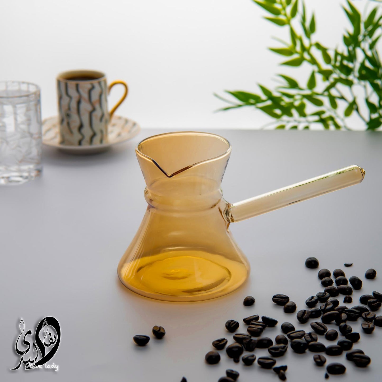 كنكة زجاج بلون اصفر