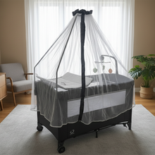 سرير أطفال مع ناموسية وطاولة تغيير