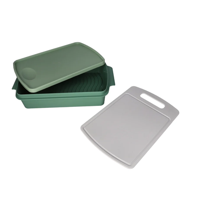 علبة التتبيلة والطعام ولوح التقطيع