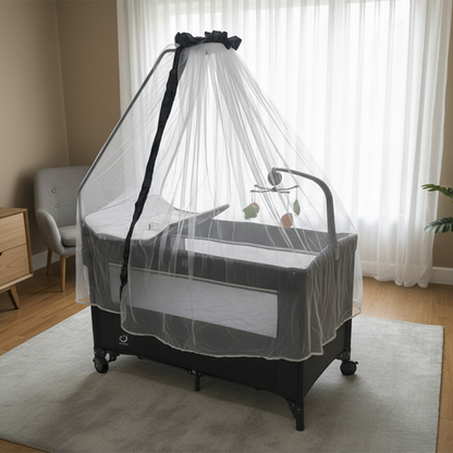 سرير أطفال مع ناموسية وطاولة تغيير