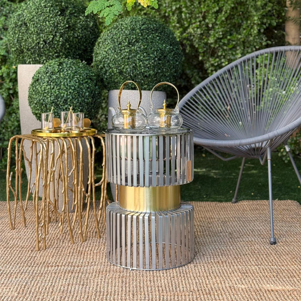 دوة و شواية معدنية بإطار ذهبي