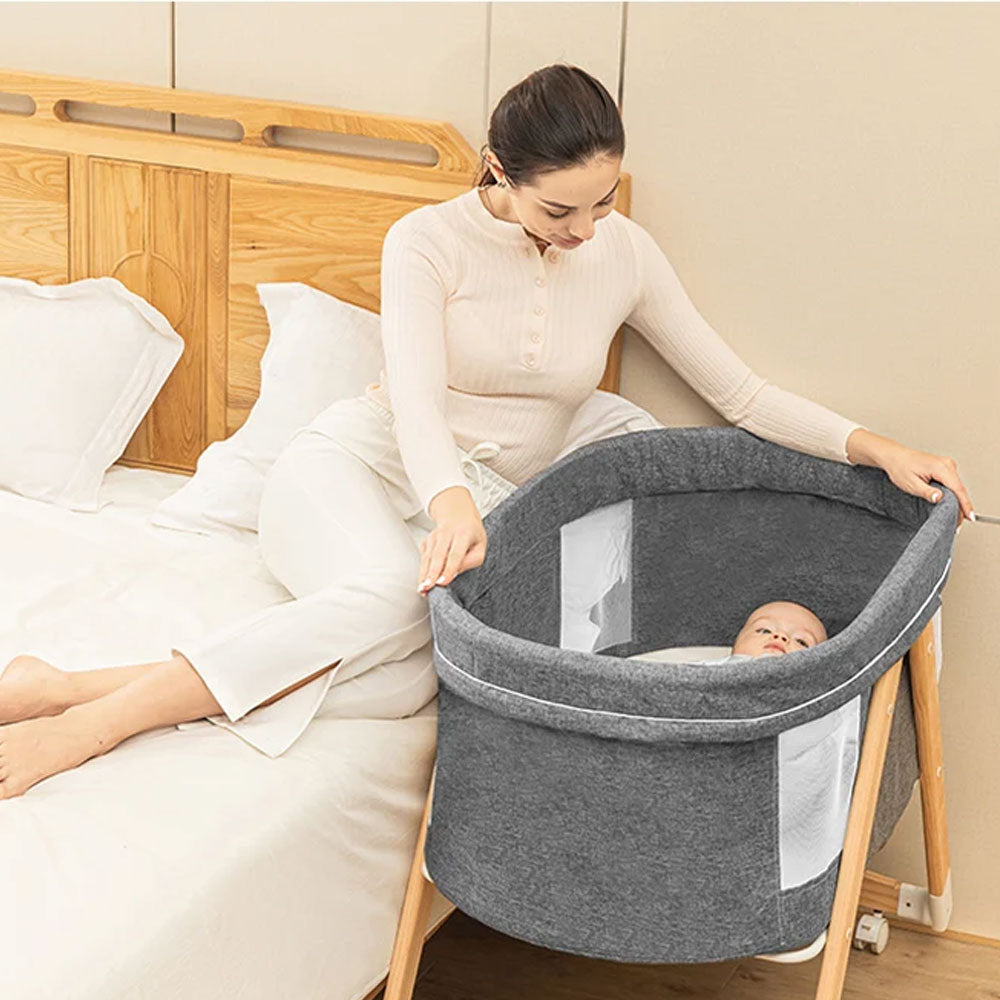 سرير أطفال متحرك من الخشب الصلب