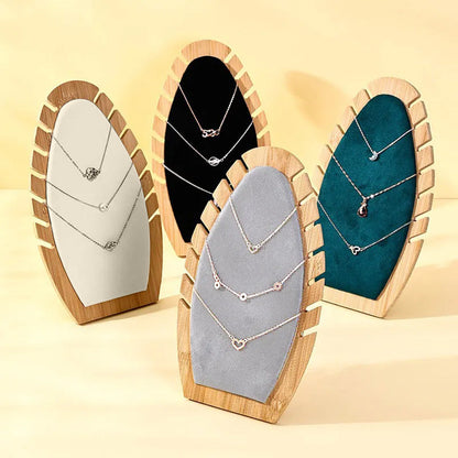 حامل المجوهرات على شكل أوراق النخيل