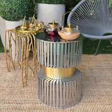 دوة و شواية معدنية بإطار ذهبي