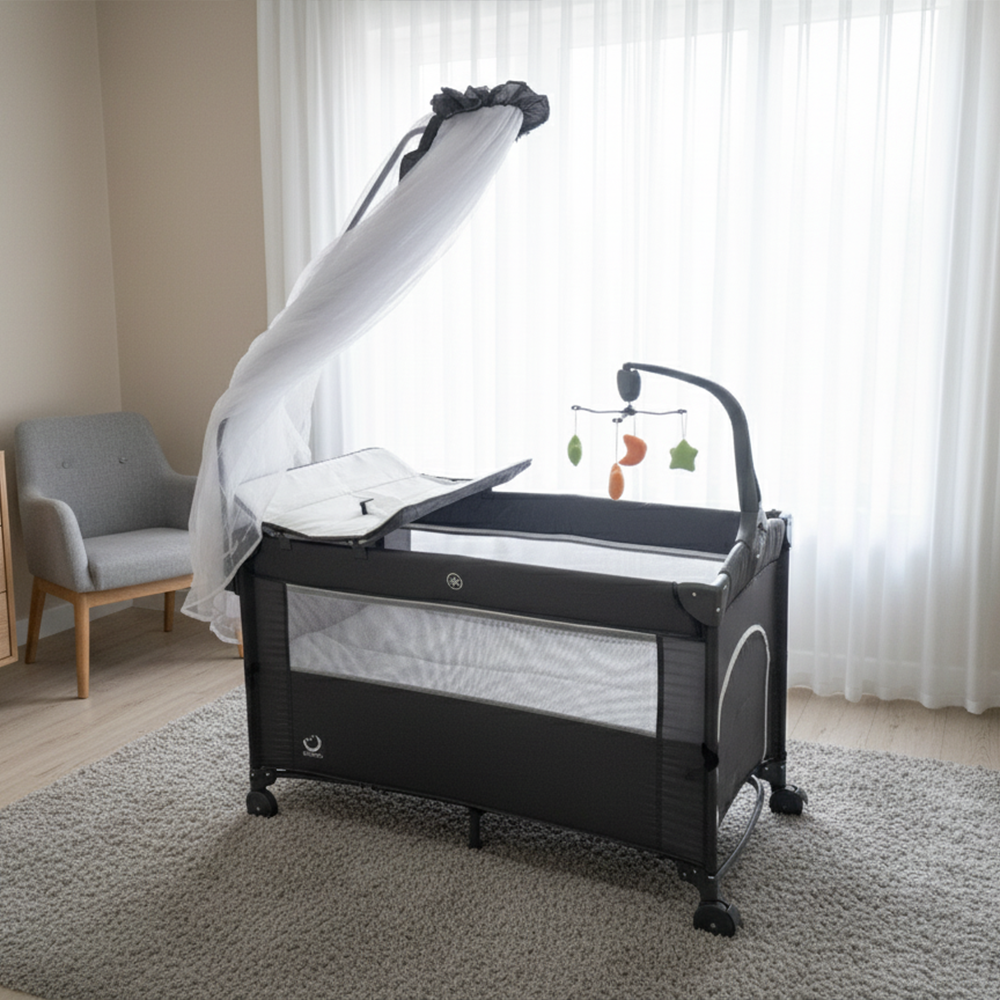 سرير أطفال مع ناموسية وطاولة تغيير