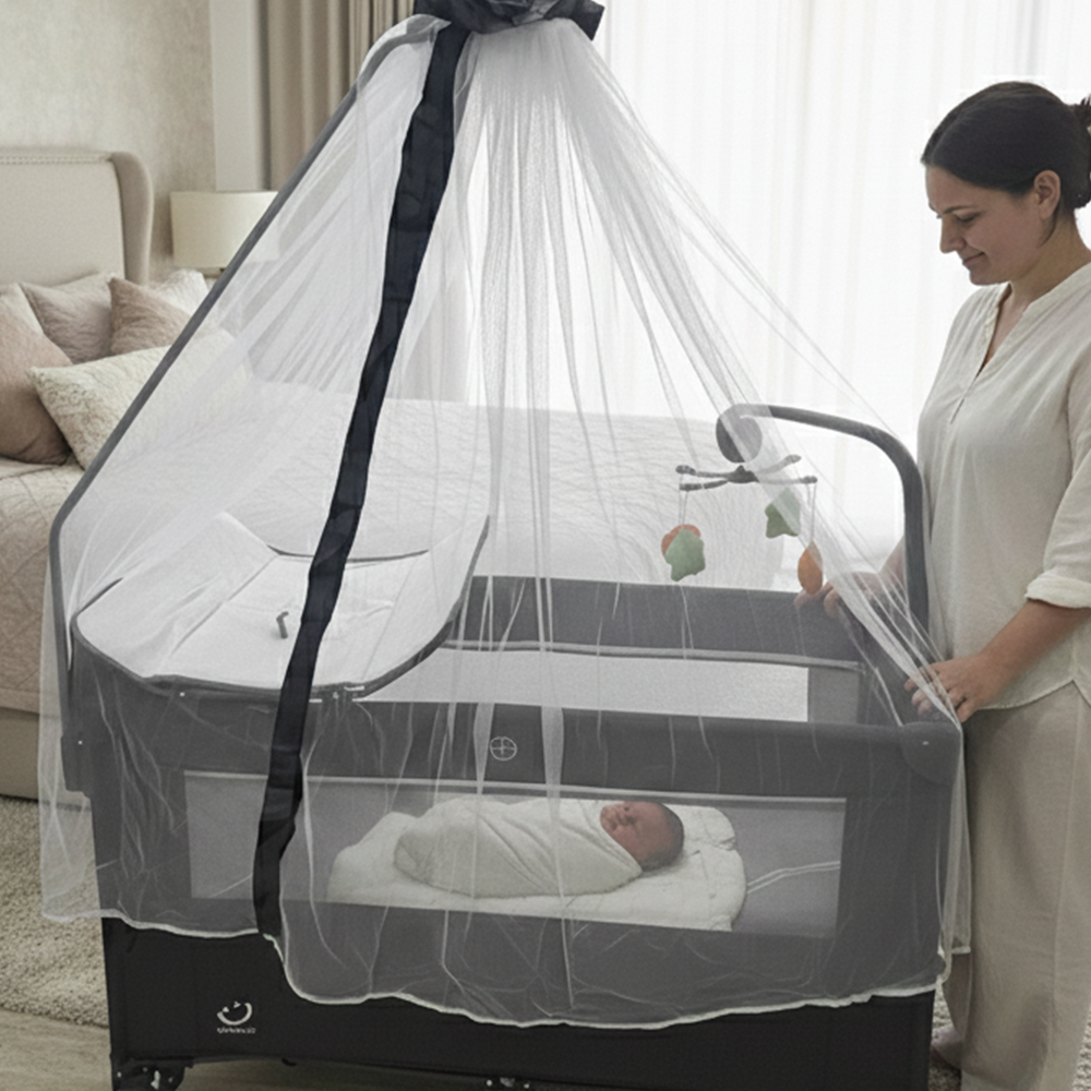 سرير أطفال مع ناموسية وطاولة تغيير