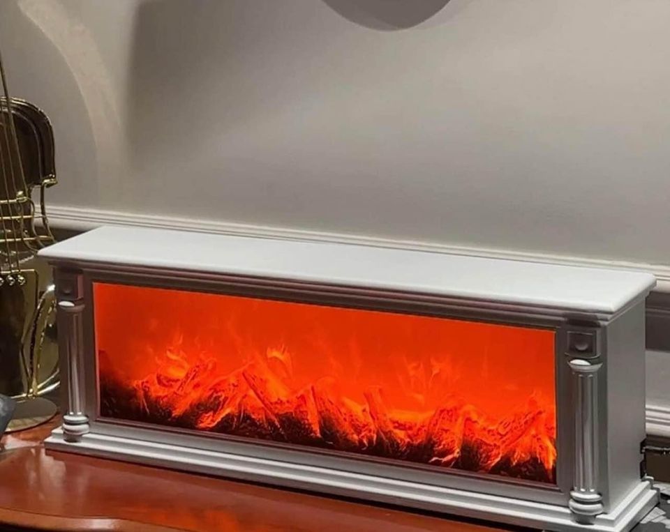 إضاءة ديكور على شكل مدفأة الحطب