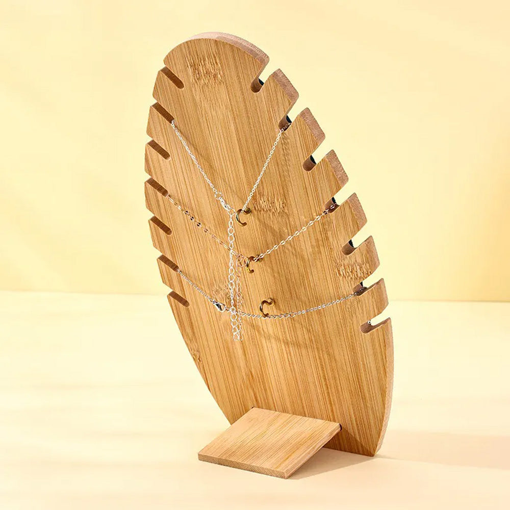 حامل المجوهرات على شكل أوراق النخيل