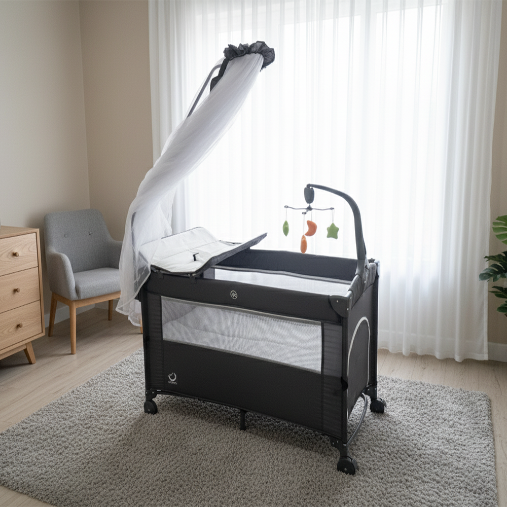 سرير أطفال مع ناموسية وطاولة تغيير