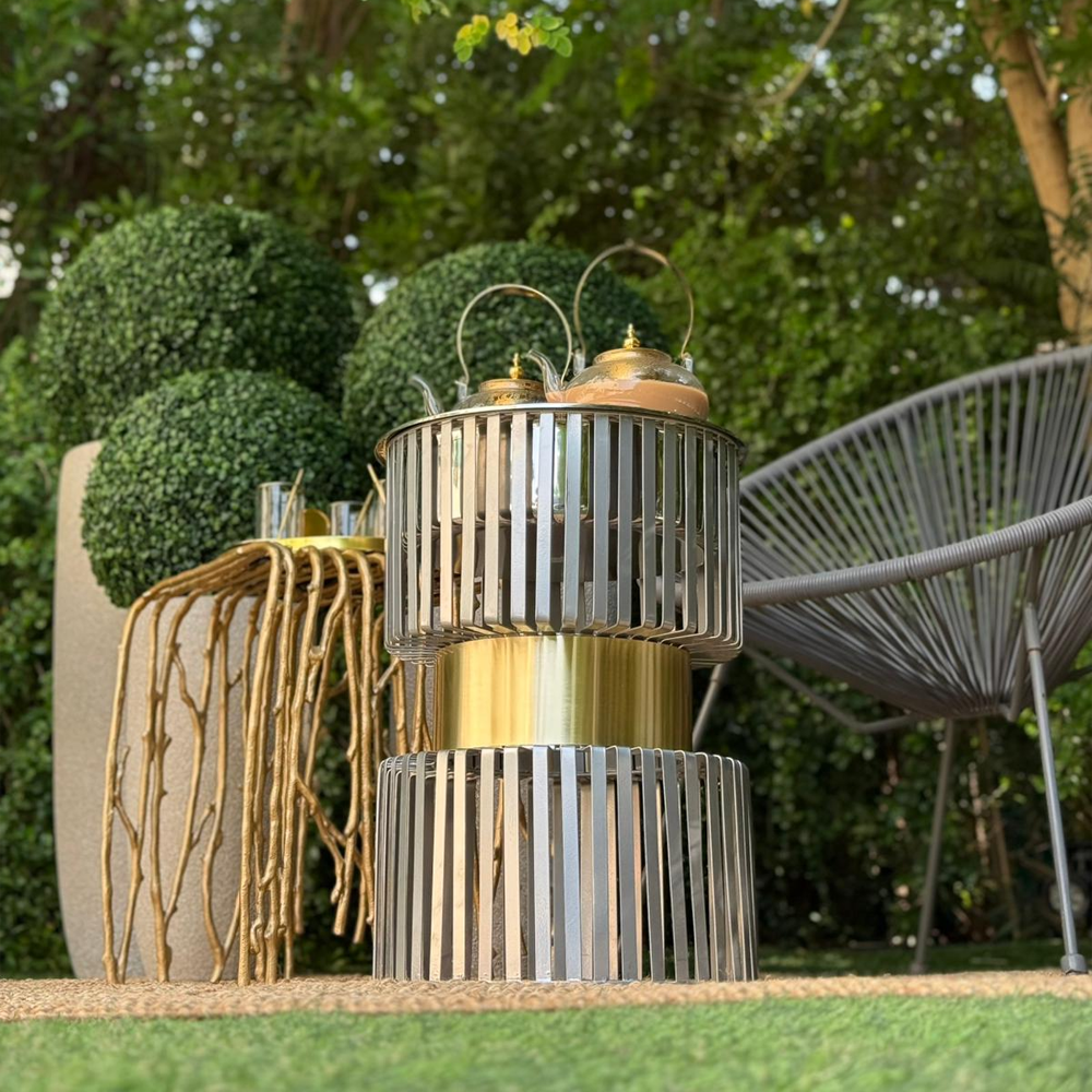 دوة و شواية معدنية بإطار ذهبي