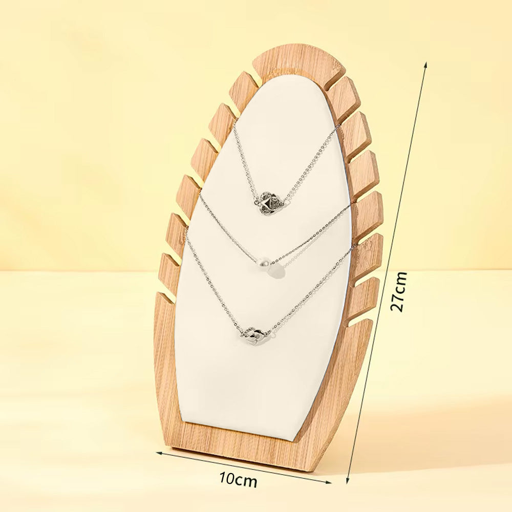 حامل المجوهرات على شكل أوراق النخيل