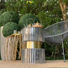 دوة و شواية معدنية بإطار ذهبي