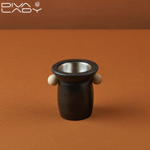 مبخر مع قطعة معدنية