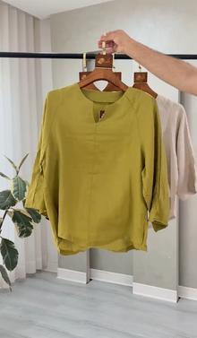 قميص نسائي بياقة ٧