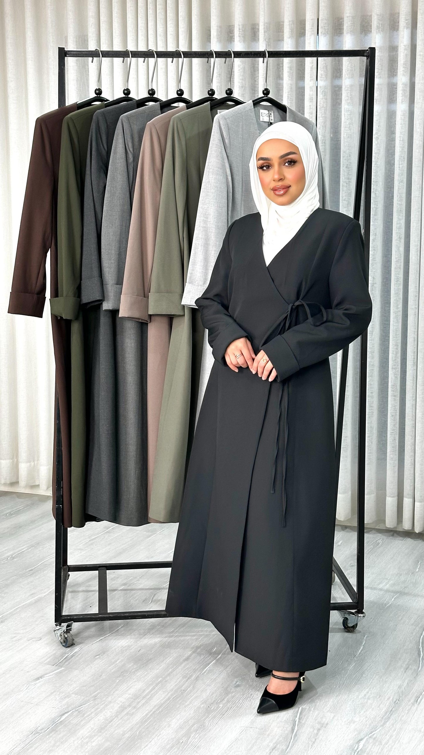 جاكيت نسائي لف طويل