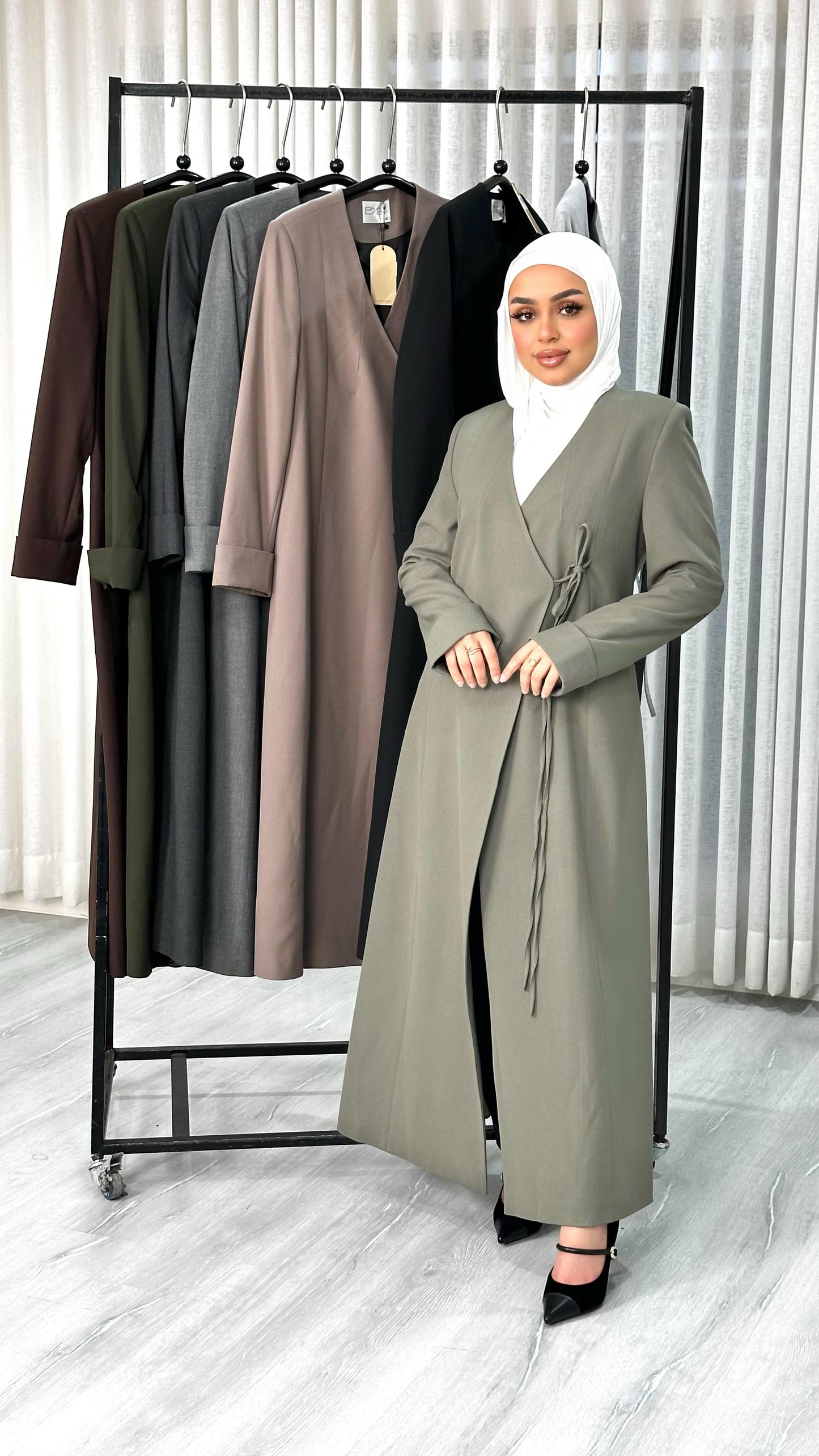 جاكيت نسائي لف طويل