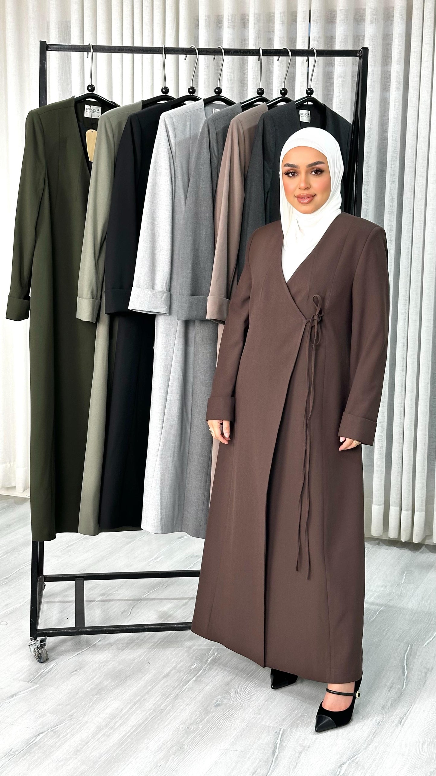 جاكيت نسائي لف طويل