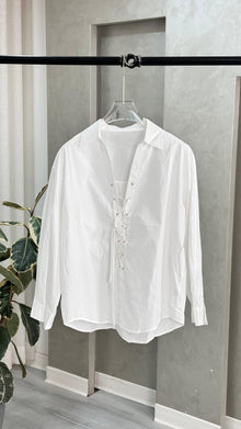 قميص نسائي بازرار