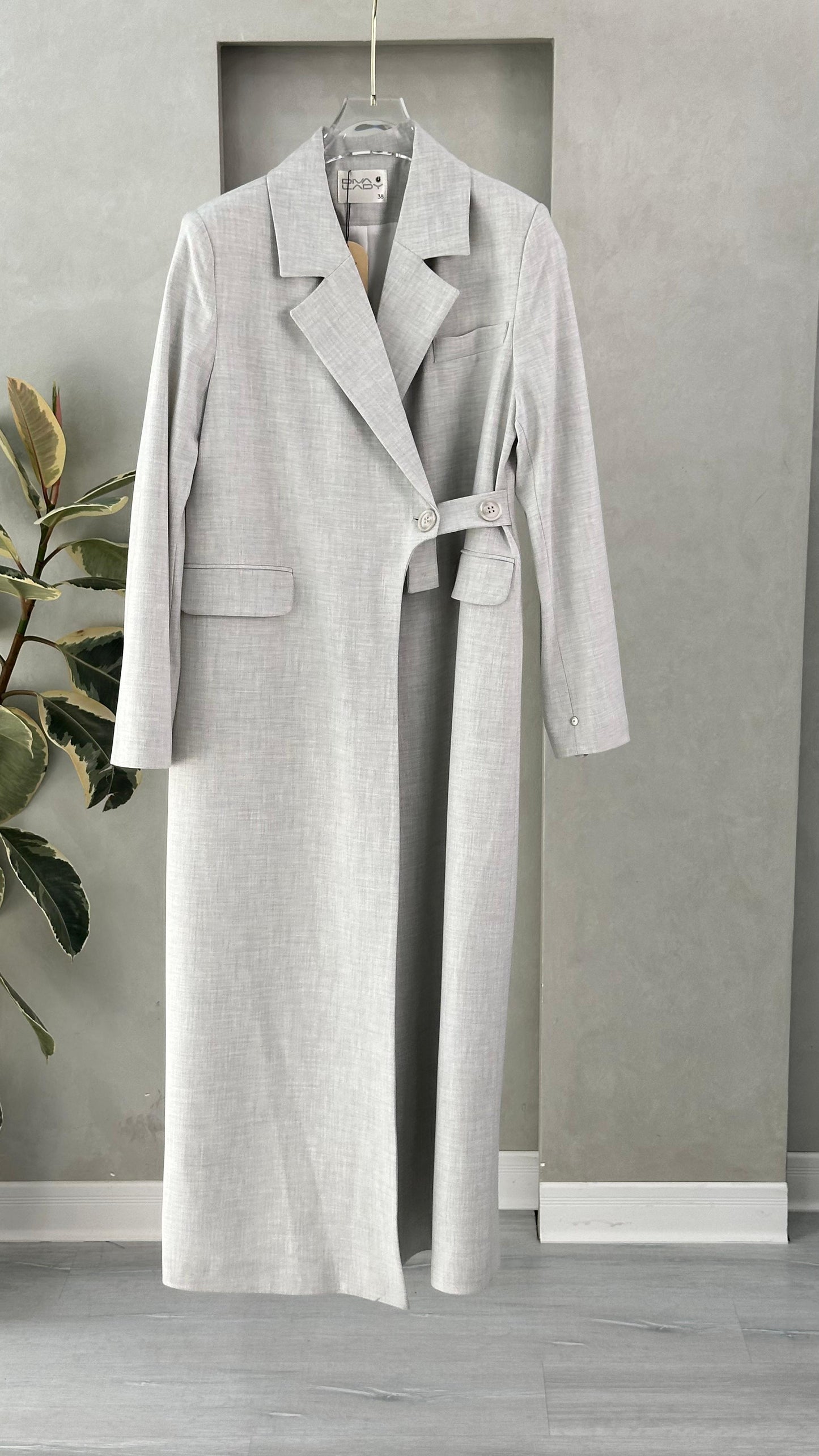 جاكيت حزام ع جنب ازرار