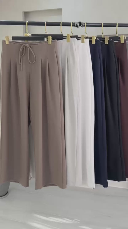 بنطلون نسائي واسع بكسرة