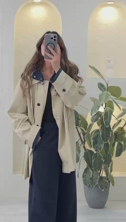 جاكيت ترنش كوت قصير بلمسة رياضية